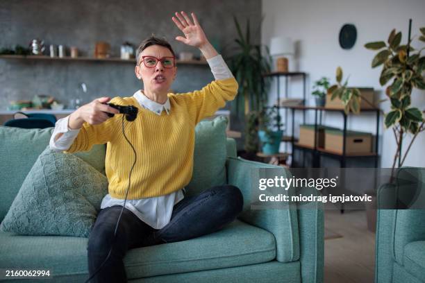 loosing the game - gamepad stock pictures, royalty-free photos & images