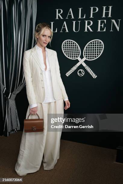 Poppy Delevingne wearing Ralph Lauren, attends day one of the Wimbledon Tennis Championships at the All England Tennis and Croquet Club at Wimbledon...