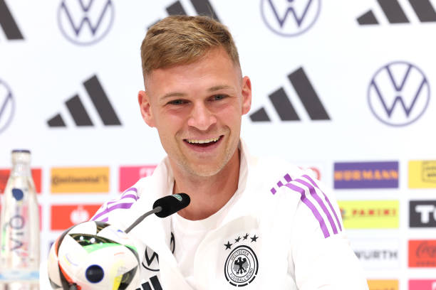 Joshua Kimmich of Germany smiles during a press conference at adidas HQ Herzo-Base on July 01, 2024 in Herzogenaurach, Germany.