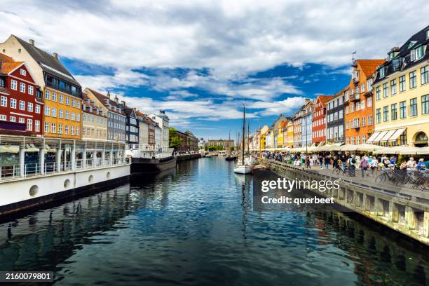 nyhavn in copenhagen by sunset - nyhavn stock pictures, royalty-free photos & images