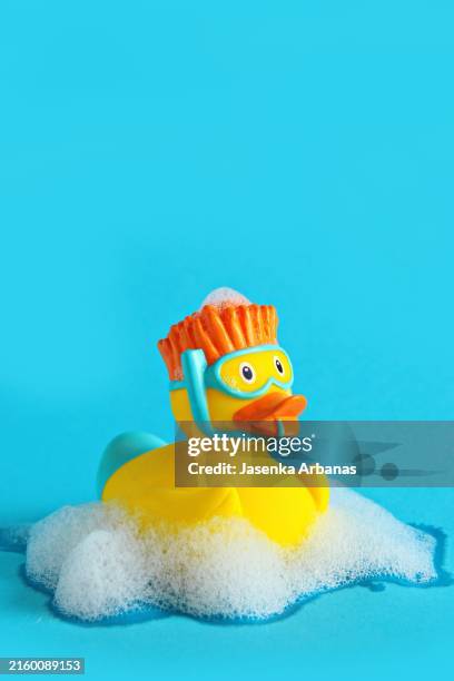 yellow rubber duck - bath toys stock pictures, royalty-free photos & images