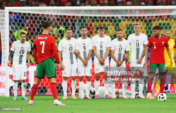 General view as Cristiano Ronaldo of Portugal prepares to take a free kick during the UEFA EURO 2024 round of 16 match between Portugal and Slovenia...