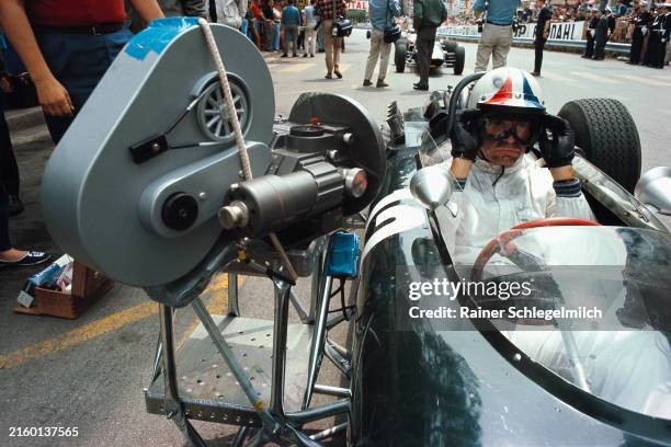 Film camera is attached to actor James Garner's F1 vehicle for racing action for John Frankenheimer's motion picture Grand Prix during the Monaco GP...