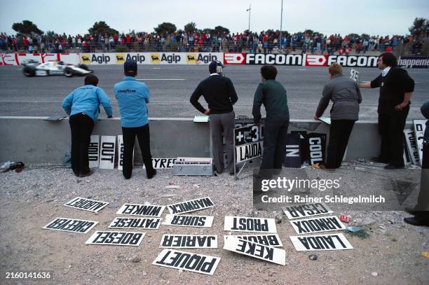 Frank Williams and his crew at the pitwall during the race as Jacques Laffite, Williams FW08C Ford, passes during the French GP at Circuit Paul...