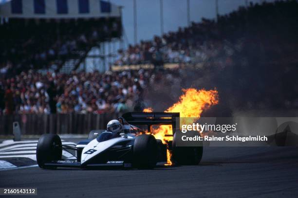 Andrea de Cesaris, Brabham BT56 BMW, suffering an engine fire during the British GP at Silverstone on July 12, 1987 in Silverstone, United Kingdom.