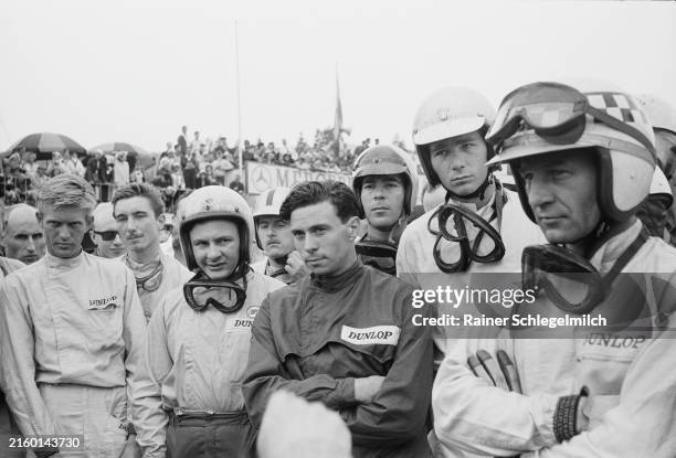 Tony Maggs, Jo Siffert, Bruce McLaren, Lucien Bianchi, Jim Clark, Tony Settember, Jim Hall and Innes Ireland attend the drivers' briefing before the...