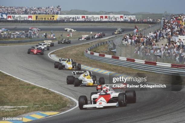 Niki Lauda, McLaren MP4-2 TAG, leads Keke Rosberg Williams FW09B Honda, Jacques Laffite Williams FW09B Honda and Michele Alboreto, Ferrari 126C4...