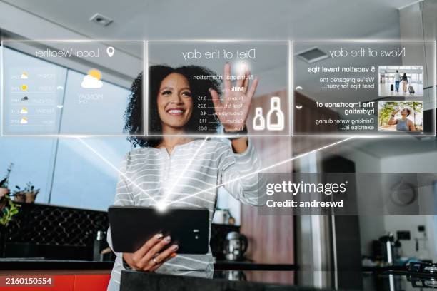 ai woman using artificial intelligence digital tablet device - cloud application stock pictures, royalty-free photos & images
