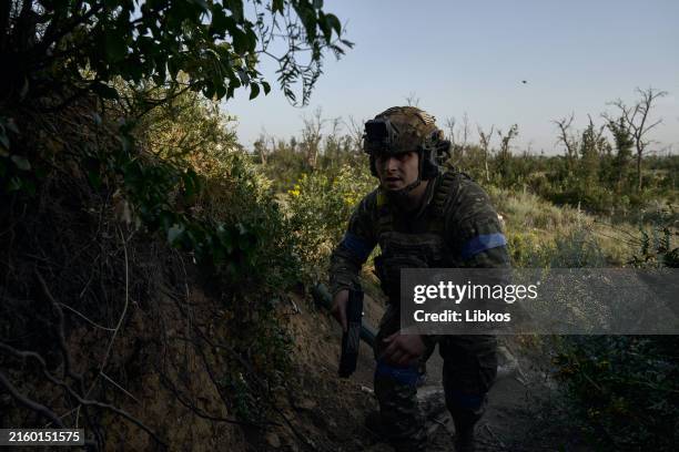 Ukrainian infantry on the zero line of the front in prepared trenches 100 meters from the Russian trenches on July 5, 2025 in the direction of...
