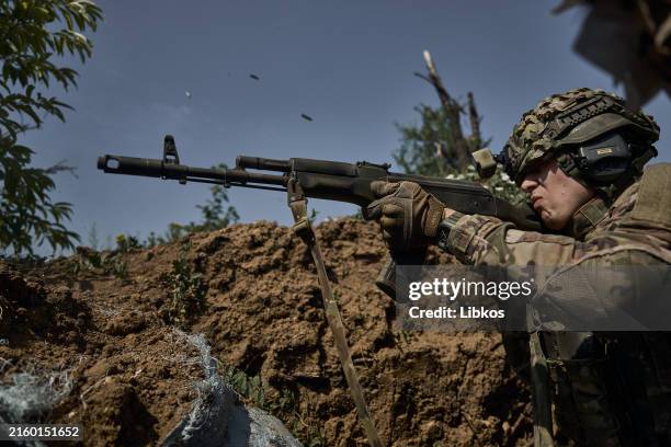 Ukrainian infantry fire at Russian positions on the zero line of the front in prepared trenches 100 meters from the Russian trenches on July 5, 2025...