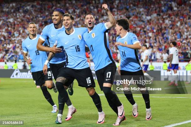 Mathias Olivera of Uruguay celebrates with teammates after scoring the team's first goal during the CONMEBOL Copa America 2024 Group C match between...