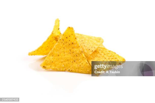 salted corn snack nachos chips isolated on white - tortilla chip stock pictures, royalty-free photos & images