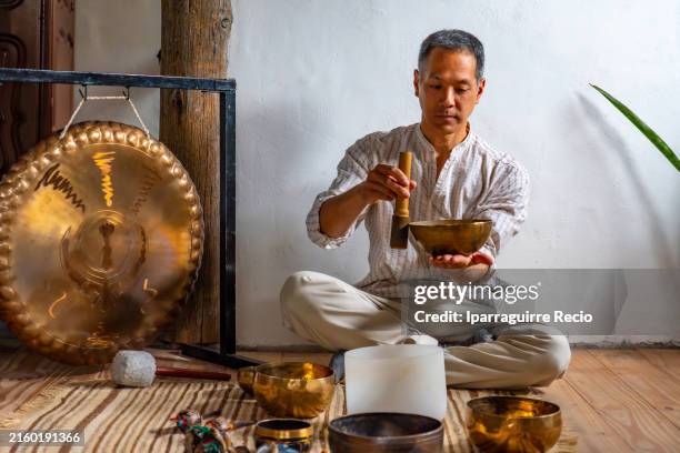 Man Ringing Gong 1,939 Man Gong Stock Photos, High-Res Pictures, and Images - Getty Images