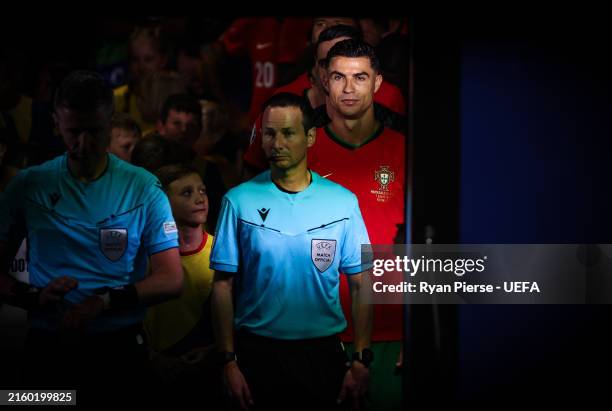 Cristiano Ronaldo of Portugal looks on as he lines up with teammates in the tunnel prior to the during the UEFA EURO 2024 round of 16 match between...