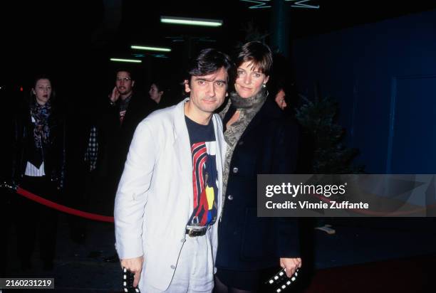 Actor and producer Griffin Dunne with his wife Carey Lowell at the "Dumb and Dumber" Hollywood Premiere, Pacific's Cinerama Dome, Hollywood,...