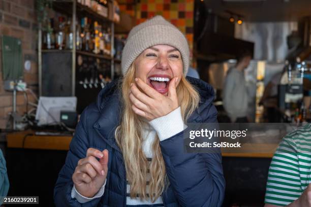 wiping ketchup from her mouth - tynemouth stock pictures, royalty-free photos & images