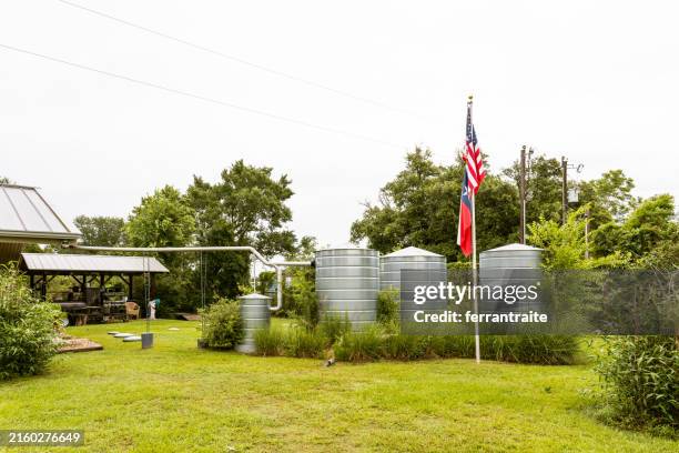 rain water harvesting system - rainwater harvesting system stock pictures, royalty-free photos & images