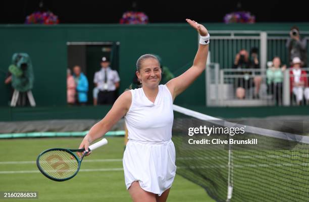 Jelena Ostapenko of Latvia celebrates winning match point against Ajla Tomljanovic of Australia in her Ladies' Singles first round match during day...