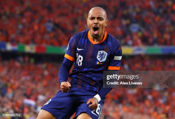 Donyell Malen of the Netherlands celebrates scoring his team's third goal during the UEFA EURO 2024 round of 16 match between Romania and Netherlands...