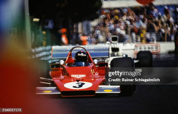 Jacky Ickx, Ferrari 312B3 leads Denny Hulme, McLaren M23 Ford during the Monaco GP at Circuit de Monaco on Sunday June 03, 1973 in Monte Carlo,...