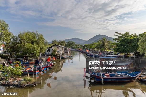 the small chines fishing village of kuala sungai pinang on the west side of penang island, malaysia. - west port malaysia stock pictures, royalty-free photos & images