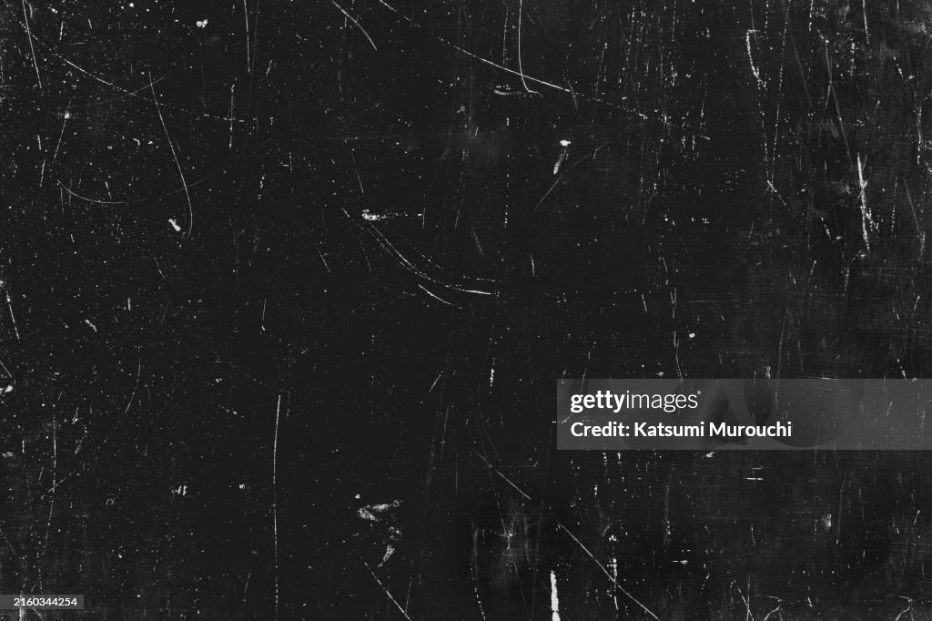 Scratched black wall texture abstract grunge background