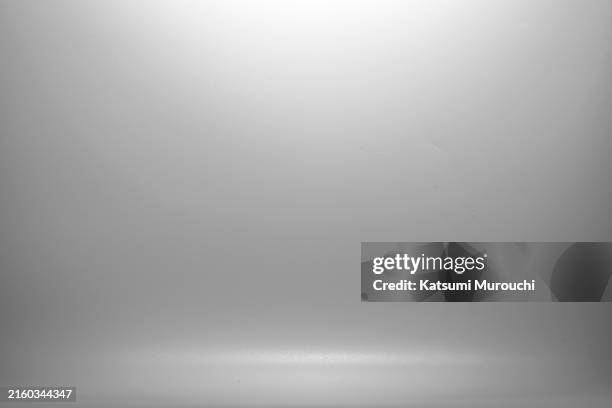 gray abstract studio wallpaper backdrop - black and white photo to colour stock pictures, royalty-free photos & images