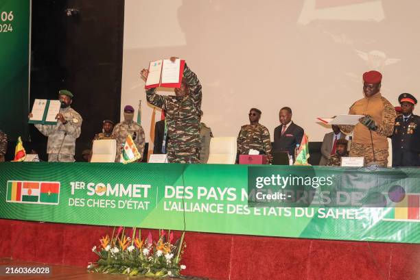 The head of head of Niger's military government General Abdourahamane Tiani , Malian Colonel Assimi Goita and Burkina Faso's Captain Ibrahim Traore...