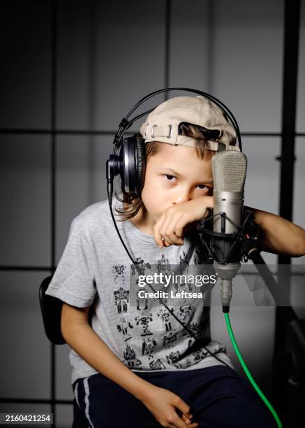 the little boy is ready to start recording - radio show stock pictures, royalty-free photos & images