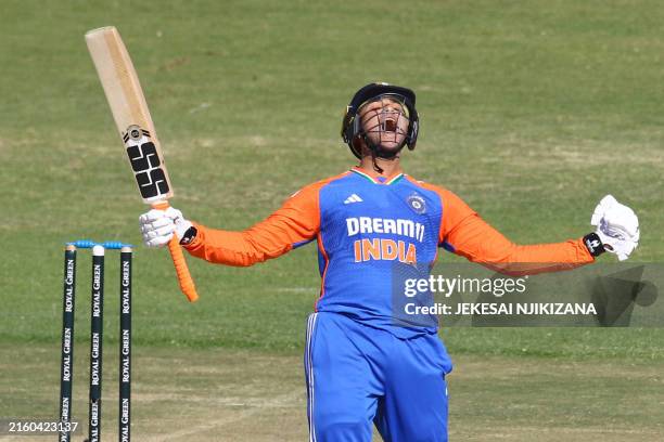 India's Abhishek Sharma celebrates after scoring a century during the second T20 international cricket match between Zimbabwe and India at Harare...