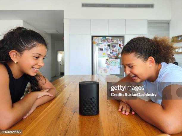 exploring technology: fun with the smart speaker. - smart speaker stock pictures, royalty-free photos & images