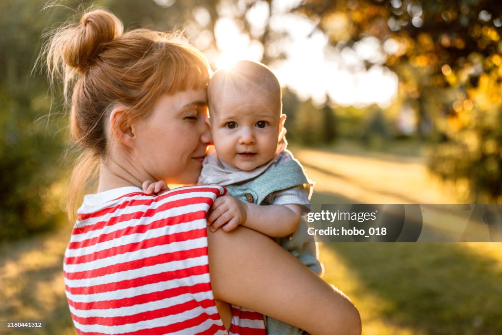 Hug for a cute little baby boy