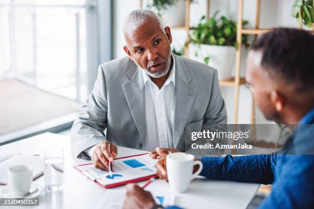 african american colleagues in business meeting - ansvar bildbanksfoton och bilder