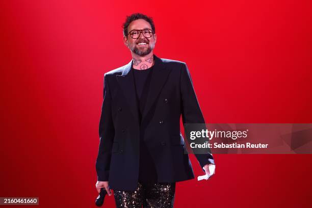 Designer Marcel Ostertag walks the runway at the COLLECTIVEFOUR Marcel Ostertag show during Berlin Fashion Week SS25 at Uber Eats Music Hall on July...