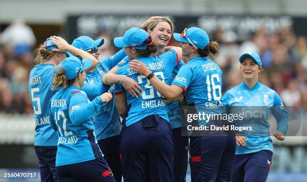 Lauren Bell of England celebrates with team mates after taking her fifth wicket of the match, that being Lauren Down during the 3rd Women's Metro...