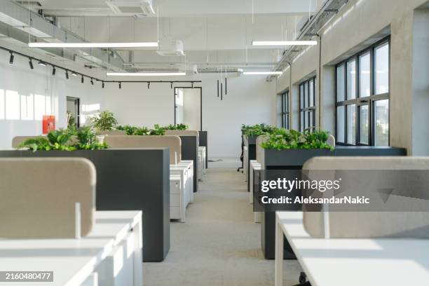 a co-working office space - hot desking stock pictures, royalty-free photos & images