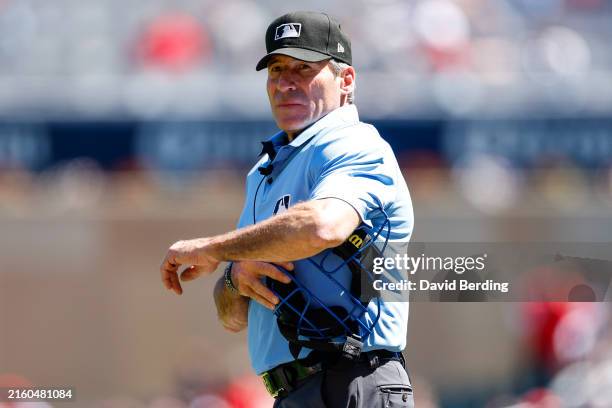 Umpire Angel Hernandez looks on in the fifth inning of the game between the Boston Red Sox and Minnesota Twins at Target Field on May 05, 2024 in...