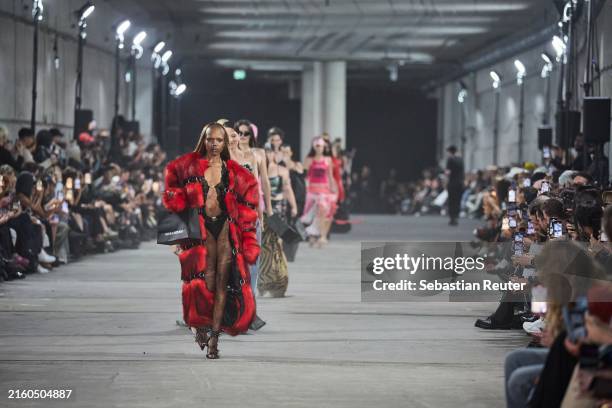 Models walk the runway at the Namilia show during Berlin Fashion Week SS25 at The Tunnel on July 03, 2024 in Berlin, Germany.