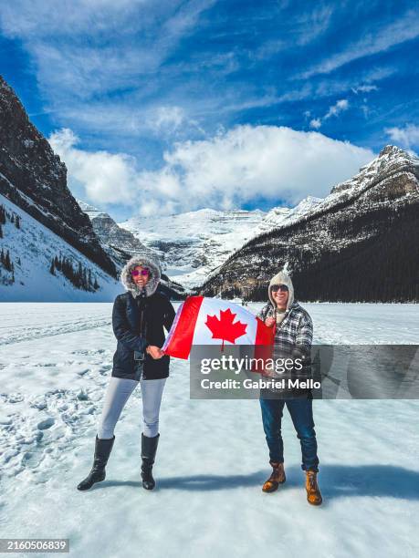 friends at lake louise - lake louise stock pictures, royalty-free photos & images