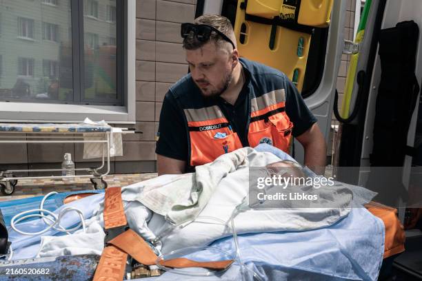 Child receives medical attention after the Russian army launched a rocket attack on the "Ohmatdyt" children's clinic with Ihor Klymenko, Minister of...