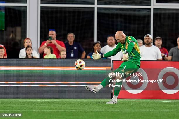 Brad Guzan of Atlanta United passes the ball during a game between Atlanta United FC and New England Revolution at Gillette Stadium on July 3, 2024...