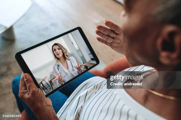 elderly medical care online video call - telemedicine stock pictures, royalty-free photos & images