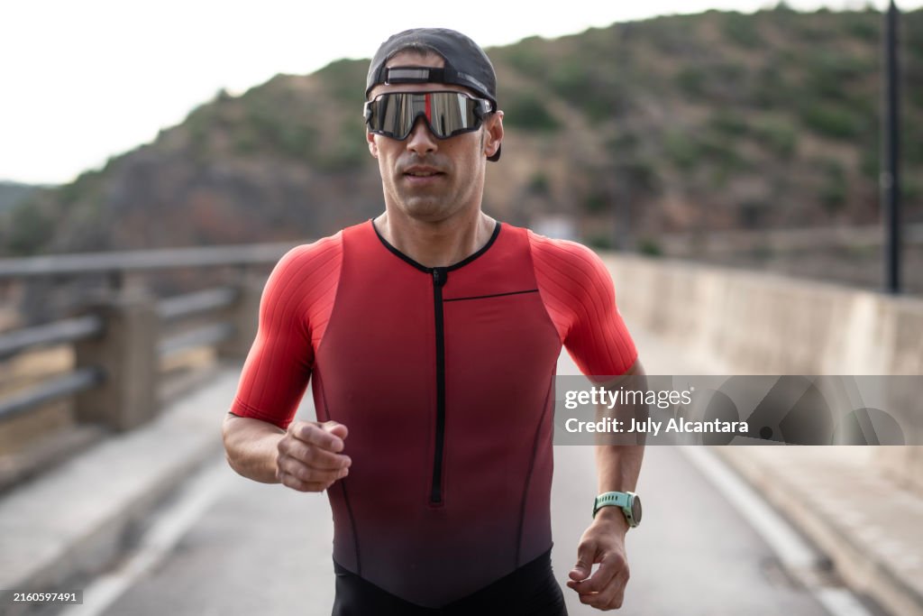 Triathlete competing and training with competition suit