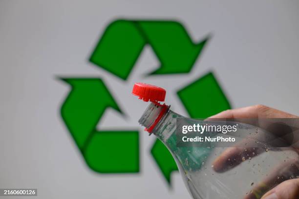 Plastic soda bottle with an attached cap is being shown as per new EU regulations in Brussels, Belgium, on July 8, 2024.