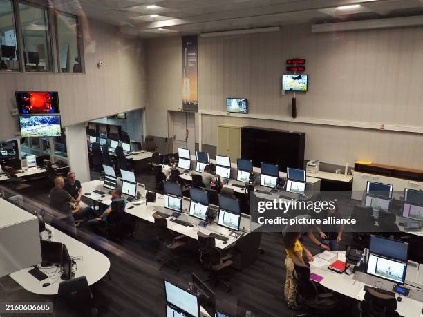 July 2024, France, Kourou: People work in the control room of the European spaceport in French Guiana, from where the new Ariane 6 launcher is to fly...