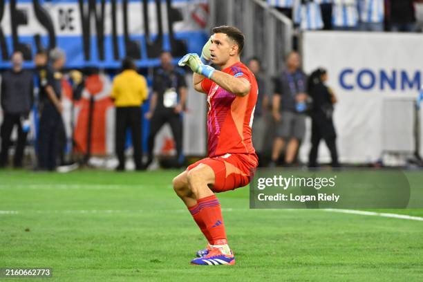 Emiliano Martinez of Argentina celebrates stoping the first penalty in the penalty shoot out during the CONMEBOL Copa America 2024 quarter-final...
