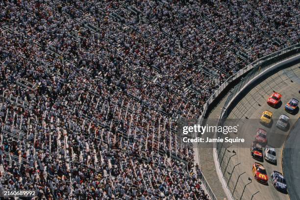 Elevated general view of race fans looking on from the bleachers as Bill Elliott from the United States driving the McDonalds Drive-Thru Bill Elliott...