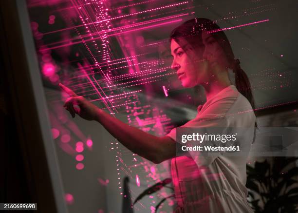 young scientist examining and using screen of ai technology - technology stock illustrations