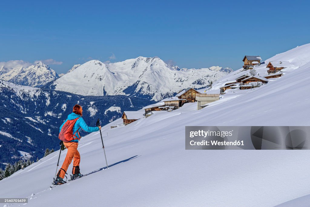 Woman climbing on Karwendel mountains at Tyrol in Austria