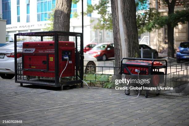 Diesel generators stand on the street on July 4, 2024 in Odesa, Ukraine. The Russian army constantly attacks energy infrastructure facilities in...